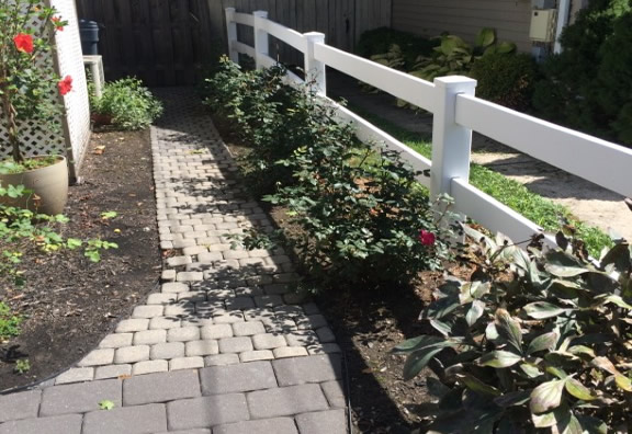 Landscaped pathway and picket fence